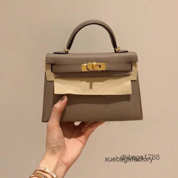 2022 womens designer bag real leather second generation kellies mini handbag portable one shoulder trio messenger bag
2022 womens designer bag real leather second generation kellies mini handbag portable one shoulder trio messenger bag