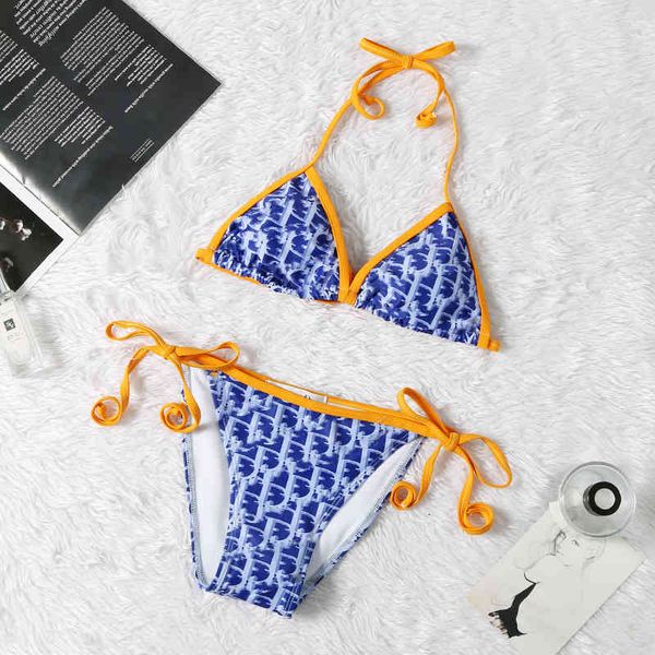 women's swimwear fashion brand bikini women's split neck strap triangle swimsuit d family letter 871r, White;black
women's swimwear fashion brand bikini women's split neck strap triangle swimsuit d family letter 871r, White;black