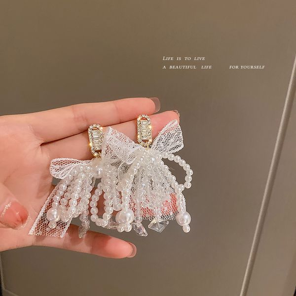 925 silver needle pearl crystal rhinestone zircon bow stud earrings korean super fairy tassel earrings fashion eardrop for women, Golden
925 silver needle pearl crystal rhinestone zircon bow stud earrings korean super fairy tassel earrings fashion eardrop for women, Golden