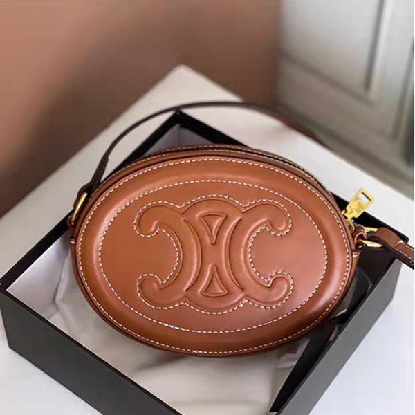 designer bags 2022 new leather shoulder temperament moon cake oblique cross women's fashion simple small round pig nose
designer bags 2022 new leather shoulder temperament moon cake oblique cross women's fashion simple small round pig nose