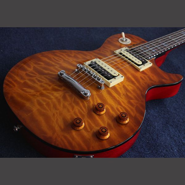 chinese electric guitar flame maple colourful inlays and binding chrome hardware high quality
chinese electric guitar flame maple colourful inlays and binding chrome hardware high quality