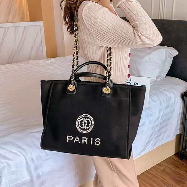 classic label pearl fashion beach bags luxury evening bag designers canvas portable large capacity female handbag brand ch women big handbag
classic label pearl fashion beach bags luxury evening bag designers canvas portable large capacity female handbag brand ch women big handbag