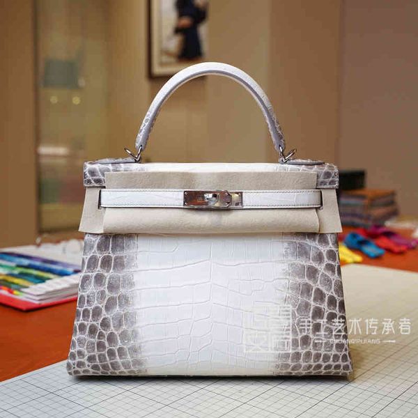 kely himalayan himalaya crocodile leather 28cm silver buckle single shoulder portable messenger bag
kely himalayan himalaya crocodile leather 28cm silver buckle single shoulder portable messenger bag
