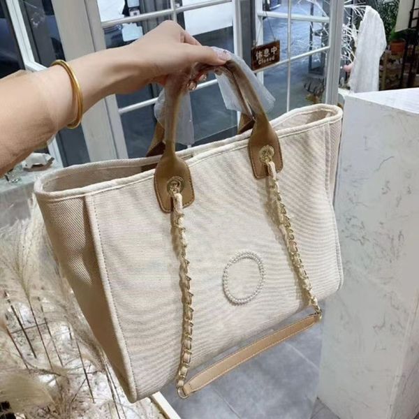 classic fashion pearl beach bags brand ch women handbags evening bag designers female canvas portable high-capacity luxury trend big handbag, Black;red
classic fashion pearl beach bags brand ch women handbags evening bag designers female canvas portable high-capacity luxury trend big handbag, Black;red