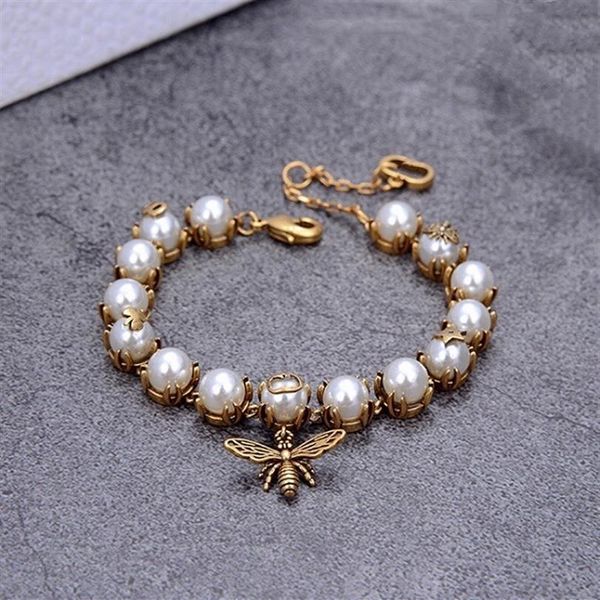 fashion jewelry women love bracelt pearl bee charm bracelets with letter stamps brass material luxury designer bracelets new style2427, Golden;silver
fashion jewelry women love bracelt pearl bee charm bracelets with letter stamps brass material luxury designer bracelets new style2427, Golden;silver