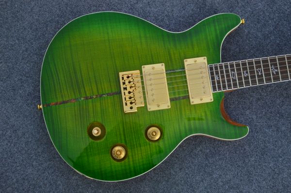 factory prs electric guitar neck through body a flame maple &color shell inlays birds gold hardware color green
factory prs electric guitar neck through body a flame maple &color shell inlays birds gold hardware color green