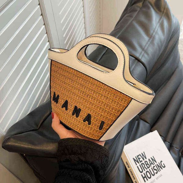 french woven handbag women s fashion straw woven bag ins vegetable basket splicing beach bag 220517
french woven handbag women s fashion straw woven bag ins vegetable basket splicing beach bag 220517
