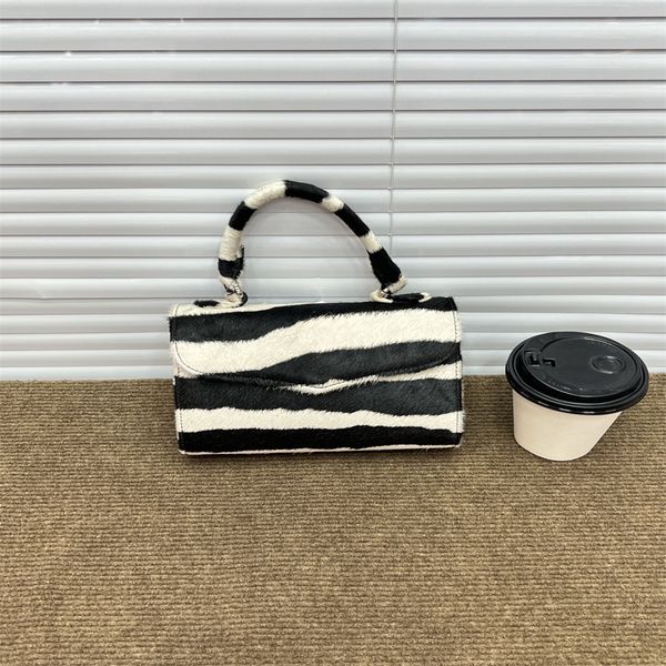 striped handbag zebra shoulder flap bag with cross fashion luxury bags black and white double color 23 18 6cm
striped handbag zebra shoulder flap bag with cross fashion luxury bags black and white double color 23 18 6cm