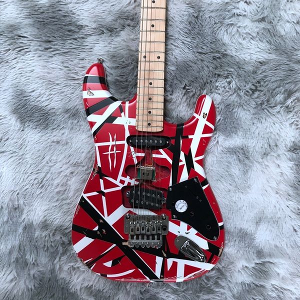 electric guitar edward eddie van halen black white stripe red heavy relic maple neck, floyd rose tremolo
electric guitar edward eddie van halen black white stripe red heavy relic maple neck, floyd rose tremolo