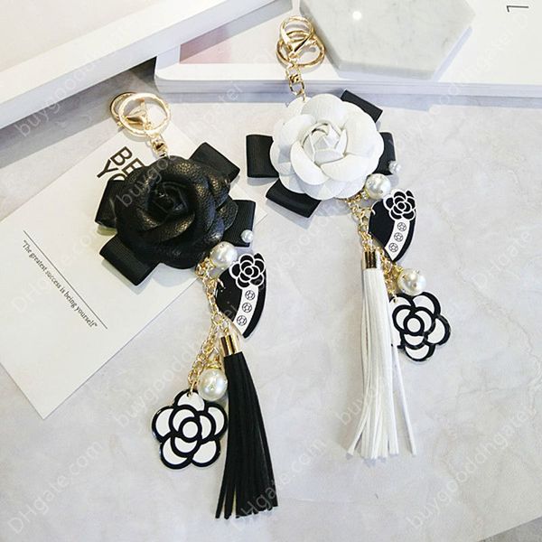 luxury bag black white woman keychain plush car camellia bags key chain, Slivery;golden
luxury bag black white woman keychain plush car camellia bags key chain, Slivery;golden