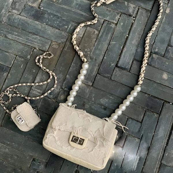 designer bags emotional world japanese niche design tassel small fragrance one shoulder diagonal pearl mini chain bag
designer bags emotional world japanese niche design tassel small fragrance one shoulder diagonal pearl mini chain bag