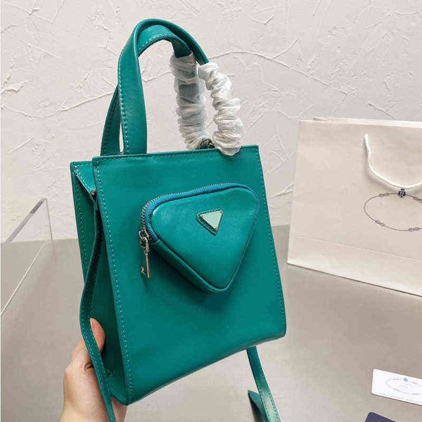 new female p family triangle bag portable single shoulder diagonal tote shopping bag mini 220420
new female p family triangle bag portable single shoulder diagonal tote shopping bag mini 220420