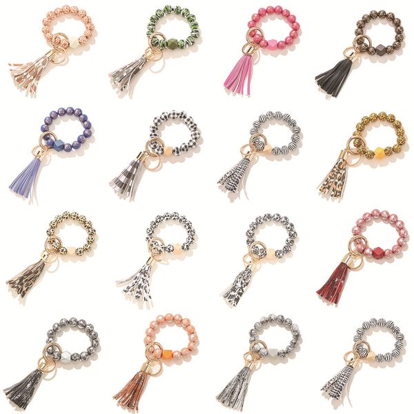 2022 new fashion floral lepoard wooden beads bracelets finger toys keychain spot colors wristbands with leather tassel for bag decoration ke, Blue
2022 new fashion floral lepoard wooden beads bracelets finger toys keychain spot colors wristbands with leather tassel for bag decoration ke, Blue