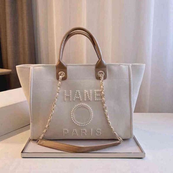 classic designer brand beach bags canvas pearl evening bag luxury portable shopping large capacity handbag women handbags label backpack lad
classic designer brand beach bags canvas pearl evening bag luxury portable shopping large capacity handbag women handbags label backpack lad