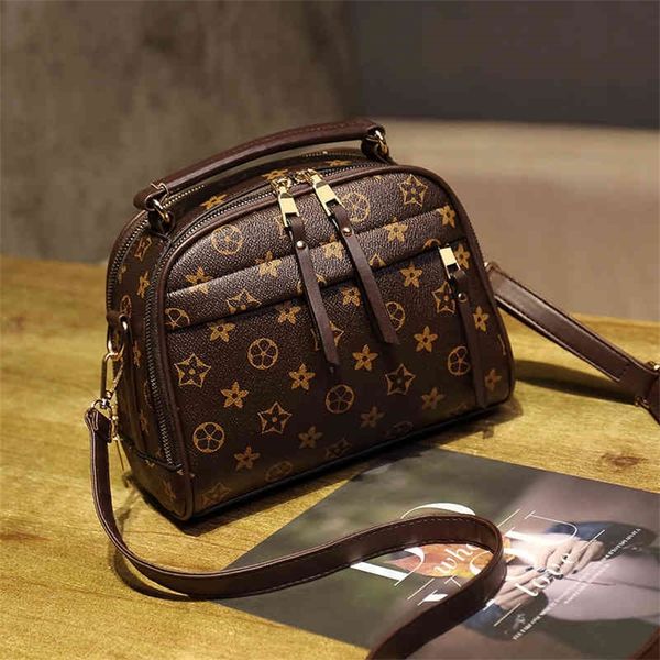 10% off 2022 new designer handbags high sense printed fashion single shoulder messenger texture portable small square
10% off 2022 new designer handbags high sense printed fashion single shoulder messenger texture portable small square