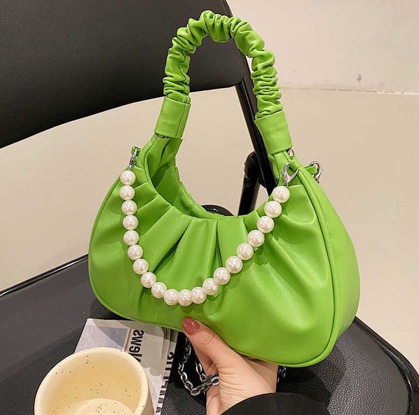 design bag female 2022 fashion versatile pearl chain portable single messenger rivet semicircle bags trendy baguette mini shoulder handbag
design bag female 2022 fashion versatile pearl chain portable single messenger rivet semicircle bags trendy baguette mini shoulder handbag