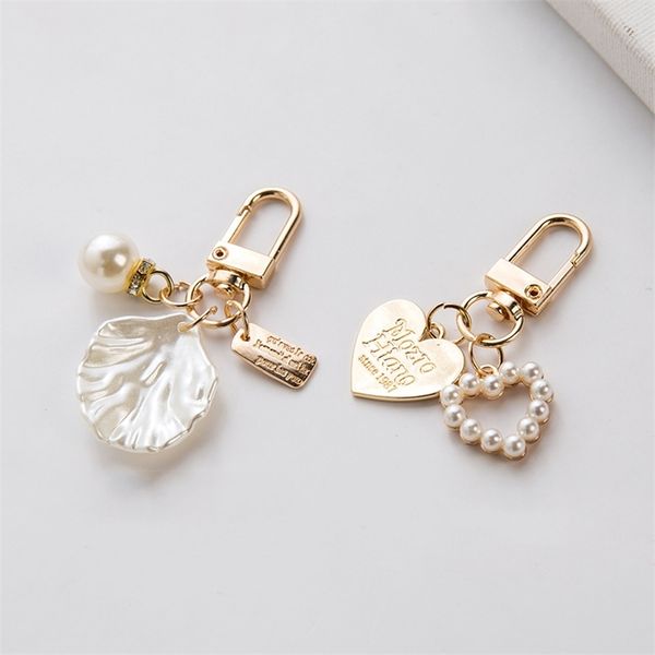 women girls heart shell pendant keychain fashion elegant letter label imitation pearls key chain handbag hanging pendant keyring 220622, Silver
women girls heart shell pendant keychain fashion elegant letter label imitation pearls key chain handbag hanging pendant keyring 220622, Silver