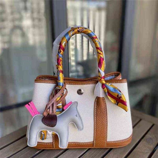 em'mas garden bag cow leather with canvas fashion portable women's shoulder big brand diagonal luxury designer bags high sense lei
em'mas garden bag cow leather with canvas fashion portable women's shoulder big brand diagonal luxury designer bags high sense lei