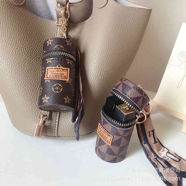 lipstick leather bucket mini bag key chain new female fashion keychain factory outlet, Silver
lipstick leather bucket mini bag key chain new female fashion keychain factory outlet, Silver