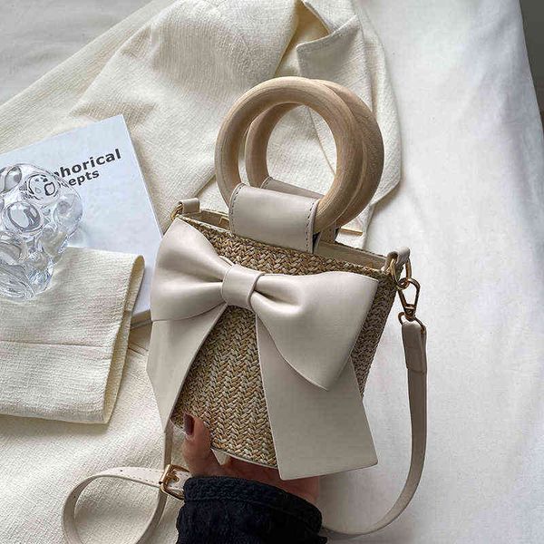 bow tie round wooden handle design mini straw crossbody side bag women 2022 summer fashion shoulder handbag cute beach totes g220517
bow tie round wooden handle design mini straw crossbody side bag women 2022 summer fashion shoulder handbag cute beach totes g220517