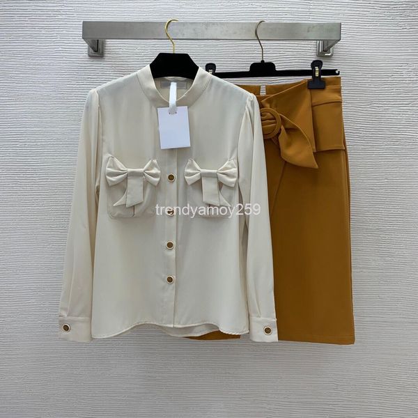 women's two piece pants early spring bow pocket small stand collar buckle long sleeved shirt with high waist skirt two-piece suit, White
women's two piece pants early spring bow pocket small stand collar buckle long sleeved shirt with high waist skirt two-piece suit, White