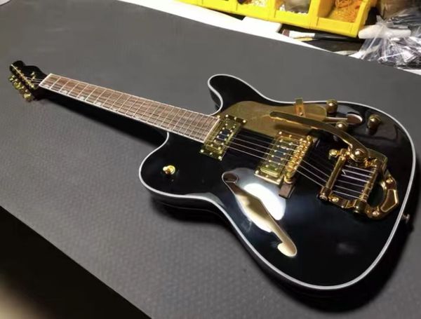 black semi-hollow body tele electric guitar fingerboard laurel wood f hole maple body gold hardware bridge tremolo
black semi-hollow body tele electric guitar fingerboard laurel wood f hole maple body gold hardware bridge tremolo