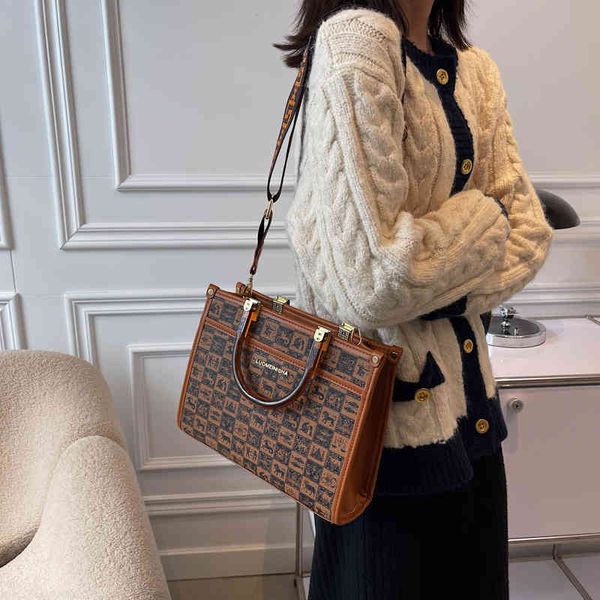 ladies fashion personality trend new brand bag wholesale female portable tote printed letter wide shoulder strap single
ladies fashion personality trend new brand bag wholesale female portable tote printed letter wide shoulder strap single