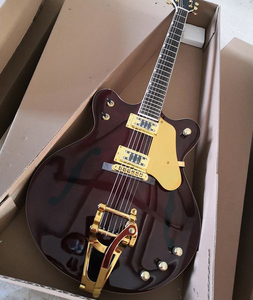 6 string wine-red semi-hollow electric guitar with tremolo bar rosewood fretboard
6 string wine-red semi-hollow electric guitar with tremolo bar rosewood fretboard