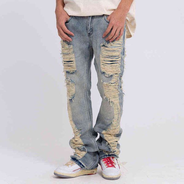 ripped frayed harajuku hole blue washed jeans pants for men and women pockets streetwear casual baggy denim trousers t220803
ripped frayed harajuku hole blue washed jeans pants for men and women pockets streetwear casual baggy denim trousers t220803