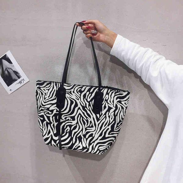 handbags 70% off autumn and winter new shoulder bag large canvas versatile mother capacity travel leopard tote bag purses
handbags 70% off autumn and winter new shoulder bag large canvas versatile mother capacity travel leopard tote bag purses