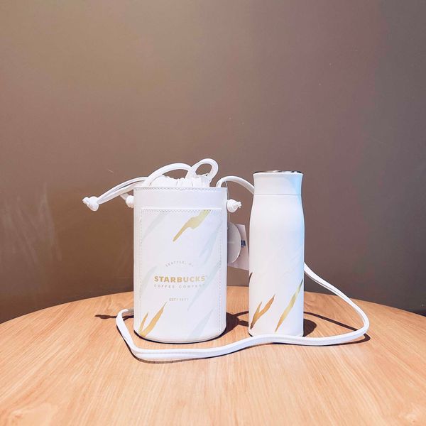 starbucks cup 2022 new year gift tiger white gold stainless steel thermos with bucket bag cover drinking
starbucks cup 2022 new year gift tiger white gold stainless steel thermos with bucket bag cover drinking