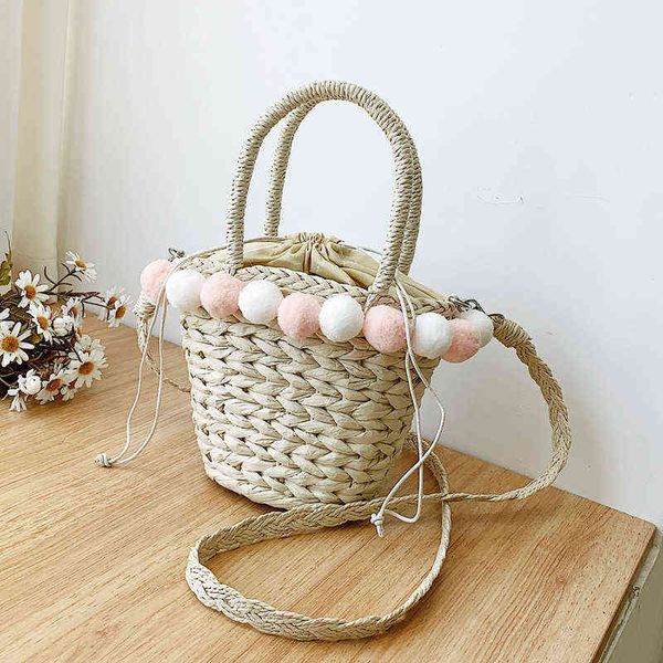 net red fashion wool ball woven handbag summer new rural grass woven messenger bag women's bag beach bag 220614
net red fashion wool ball woven handbag summer new rural grass woven messenger bag women's bag beach bag 220614