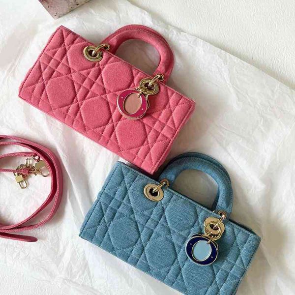 factory online export designer tide brand ladies bag d family's year new pink denim handbag one shoulder messenger underarm women'
factory online export designer tide brand ladies bag d family's year new pink denim handbag one shoulder messenger underarm women'