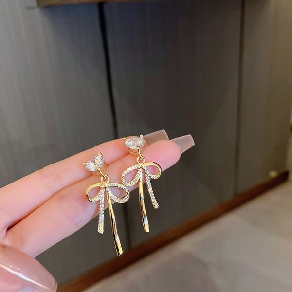 gold plated silver needle heart-shaped zircon bow earrings korean trendy elegant earrings light luxury classic style eardrop, Golden
gold plated silver needle heart-shaped zircon bow earrings korean trendy elegant earrings light luxury classic style eardrop, Golden