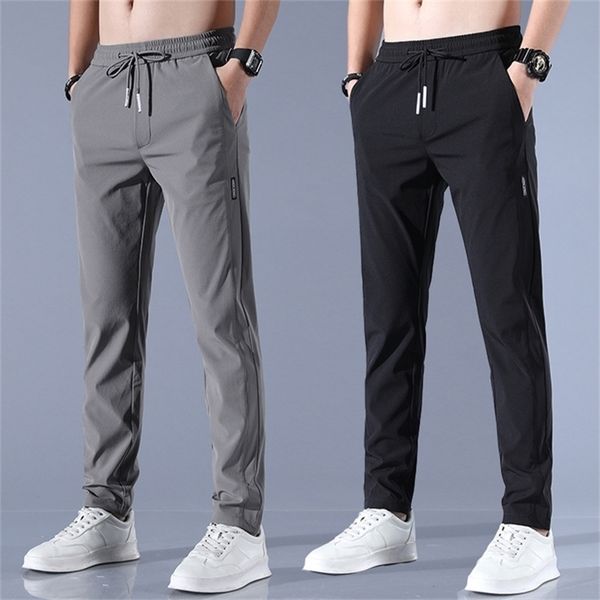 men s trousers spring summer casual solid breathable slim straight pants male joggers thin quick dry sweatpants sports 220720, Black
men s trousers spring summer casual solid breathable slim straight pants male joggers thin quick dry sweatpants sports 220720, Black