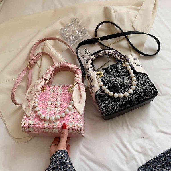 women's fashion personality trend brand bag wholesale female 2021 new korean portable small square pearl chain one shoulder msenger
women's fashion personality trend brand bag wholesale female 2021 new korean portable small square pearl chain one shoulder msenger