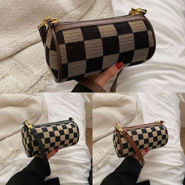 small women's new fashion lattice advanced sense single shoulder luxury designer leather handbag 
small women's new fashion lattice advanced sense single shoulder luxury designer leather handbag