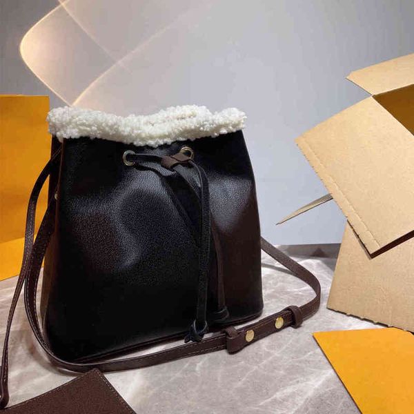 drawstring bags tote bucket handbag women lamb hair fashion shopping all-match messenger high capacity designer purses 1103
drawstring bags tote bucket handbag women lamb hair fashion shopping all-match messenger high capacity designer purses 1103
