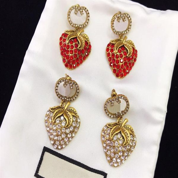 america fashion style lady women brass engraved g initials white and red diamond strawberry stud earrings 2 color258u, Golden
america fashion style lady women brass engraved g initials white and red diamond strawberry stud earrings 2 color258u, Golden