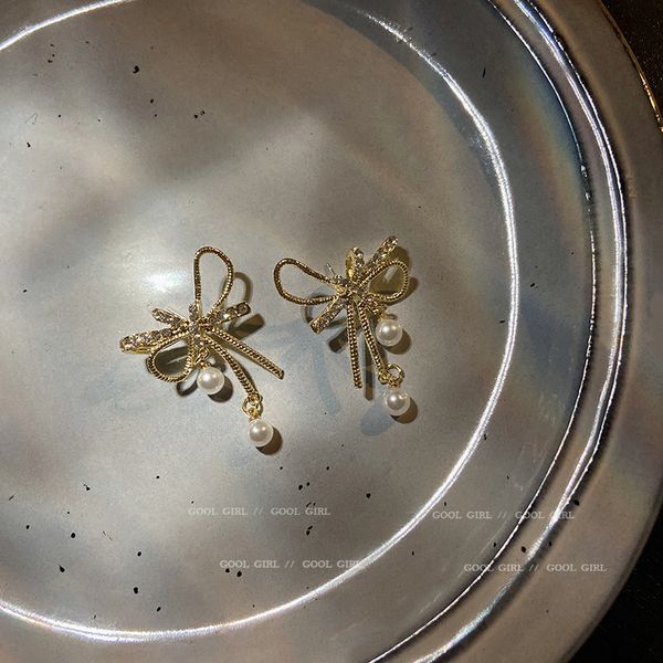 925 silver stud rhinestone-encrusted bow pearl earrings korean simple temperamental literary style earrings personalized fashion eardrop, Golden
925 silver stud rhinestone-encrusted bow pearl earrings korean simple temperamental literary style earrings personalized fashion eardrop, Golden