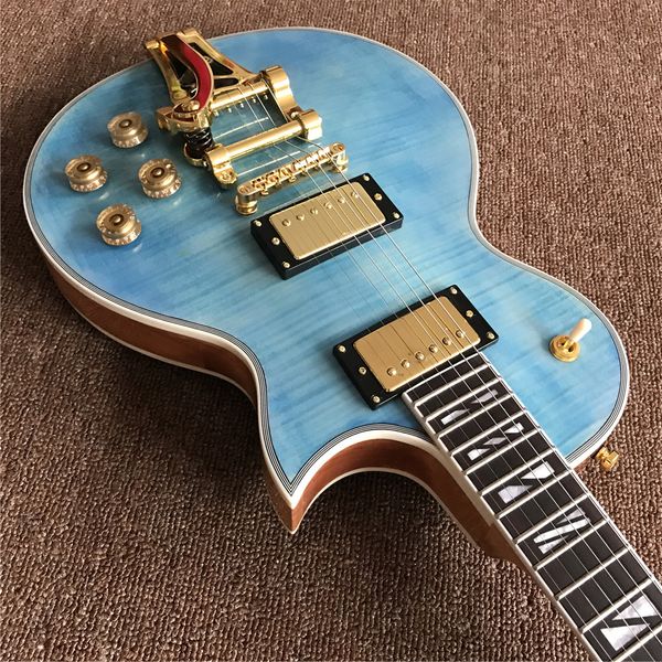 new arrival custom blue jazz electric guitar with double maple , gold color hardware , natural wood color neck 
new arrival custom blue jazz electric guitar with double maple , gold color hardware , natural wood color neck