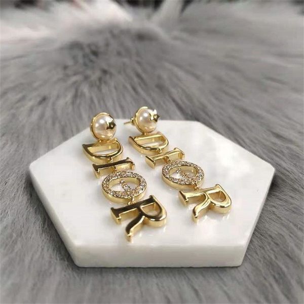 new letter long diamond inlaid brass high-grade light luxury versatile earrings and earrings, Golden
new letter long diamond inlaid brass high-grade light luxury versatile earrings and earrings, Golden