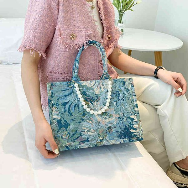 2022 new watercolor oil painting texture pearl chain tote bag portable large capacity women's designer bags for women
2022 new watercolor oil painting texture pearl chain tote bag portable large capacity women's designer bags for women