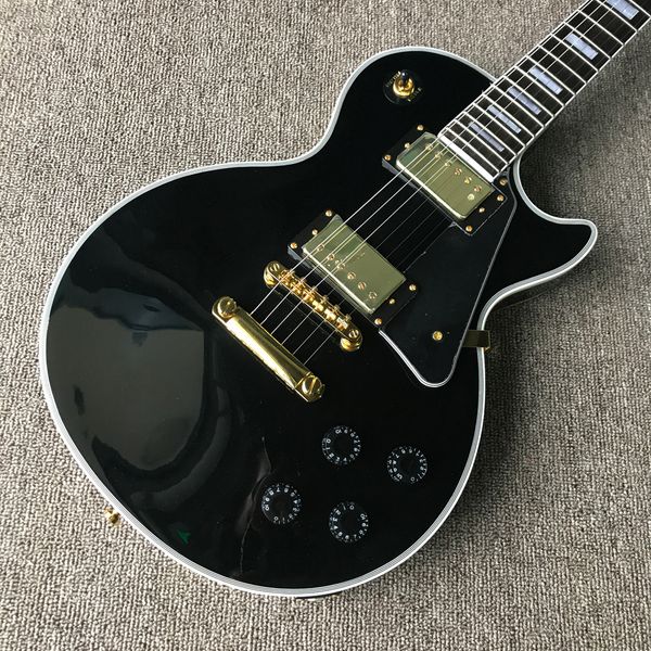 custom lp electric guitar, gold hardware, 2 pickups, rosewood fingerboard, black solid mahogany body guitar
custom lp electric guitar, gold hardware, 2 pickups, rosewood fingerboard, black solid mahogany body guitar