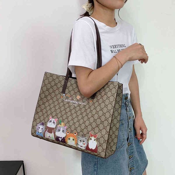 2022 factory wholesale new high sense large capacity women's fashion minority graffiti printed tote bag work commute single shoulder ba
2022 factory wholesale new high sense large capacity women's fashion minority graffiti printed tote bag work commute single shoulder ba