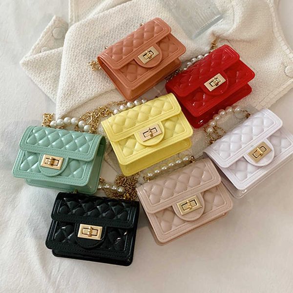 xiaoxiangfeng parent-child bag pearl handbag girls' rubber chain diagonal cross bag change children's bag, Black
xiaoxiangfeng parent-child bag pearl handbag girls' rubber chain diagonal cross bag change children's bag, Black