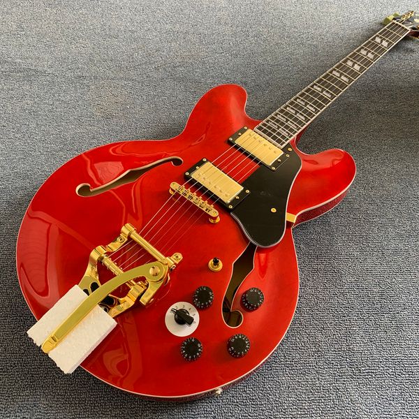 jazz hollow body electric guitar, rosewood fingerboard, 2 f holes, gold tremolo system electric guitar
jazz hollow body electric guitar, rosewood fingerboard, 2 f holes, gold tremolo system electric guitar