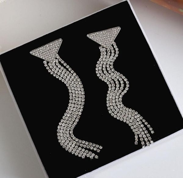 european and american triangle letters dangle & chandelier silver needle face small long tassel ear clip female fast delivery
european and american triangle letters dangle & chandelier silver needle face small long tassel ear clip female fast delivery