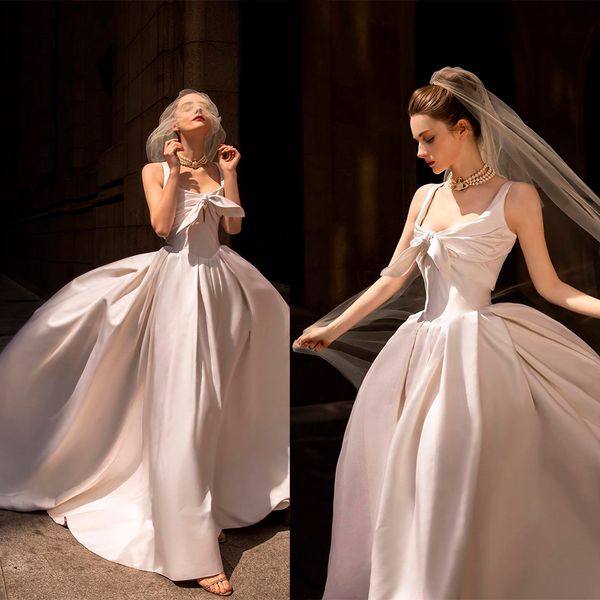 elegant satin gown wedding dress v neck sleeveless spaghetti straps bow tie appliques custom floor length made satin bridal dresses vestido, White
elegant satin gown wedding dress v neck sleeveless spaghetti straps bow tie appliques custom floor length made satin bridal dresses vestido, White