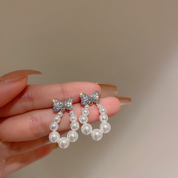 silver needle pearl zircon bow earrings south korea dongdaemun graceful personality ear stud earring fashionable and versatile earrings, Golden
silver needle pearl zircon bow earrings south korea dongdaemun graceful personality ear stud earring fashionable and versatile earrings, Golden
